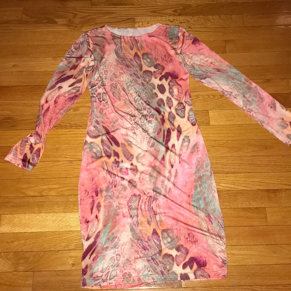 I loved this dress and never worn.